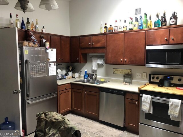 kitchen with stainless steel appliances and sink