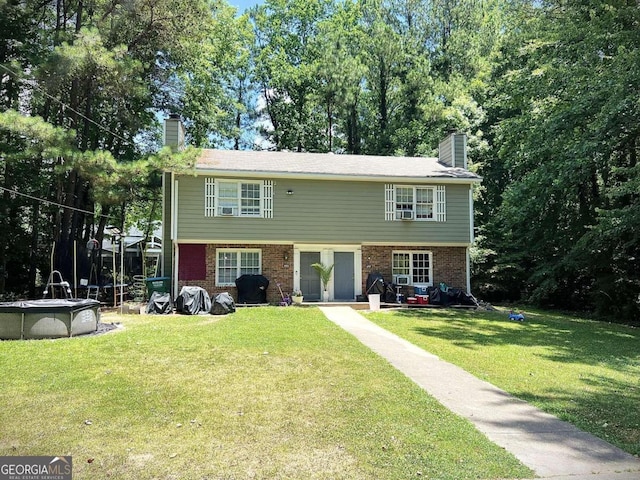 view of front of house with a front lawn