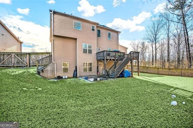 view of front facade with a garage, central AC, and a front lawn