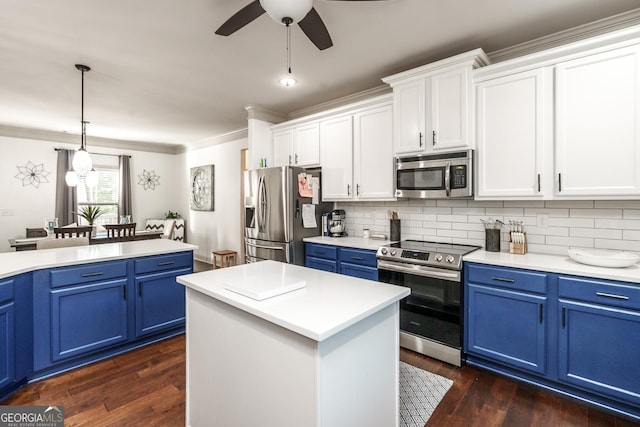 kitchen with decorative light fixtures, white cabinetry, a center island, blue cabinetry, and appliances with stainless steel finishes