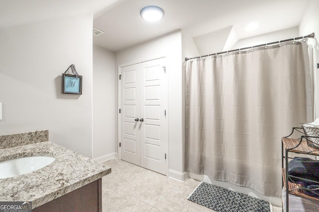 bathroom featuring vanity