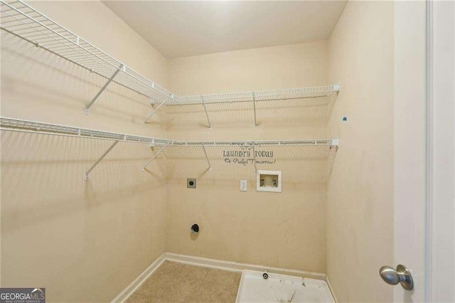 washroom with washer hookup and hookup for an electric dryer