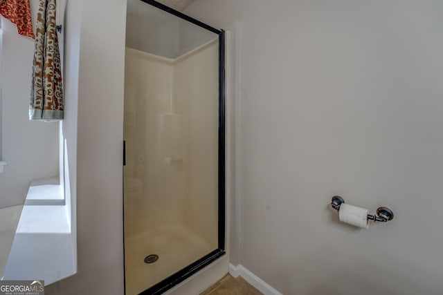 bathroom featuring walk in shower