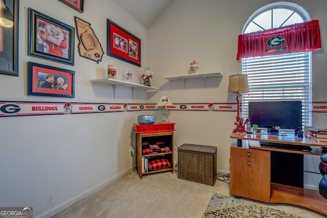 rec room featuring lofted ceiling and light carpet