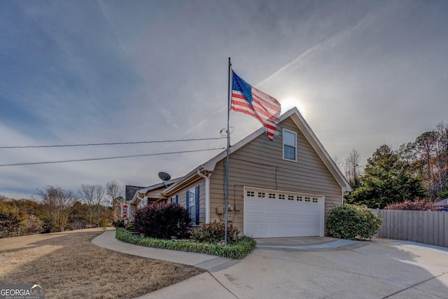 view of property exterior with a garage