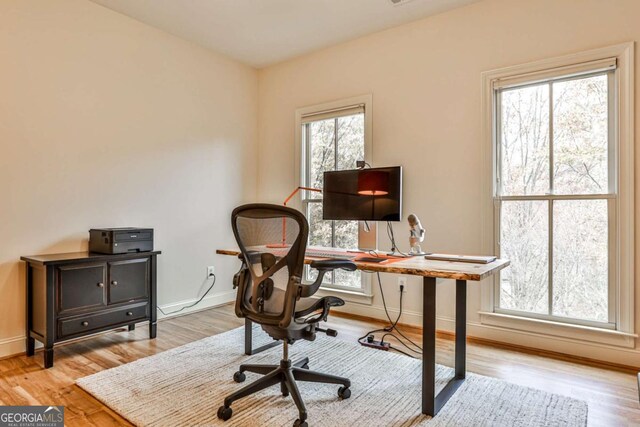 home office featuring light wood-type flooring