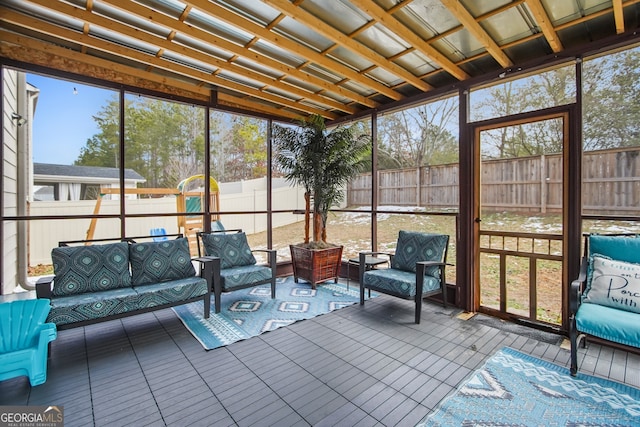 sunroom featuring a healthy amount of sunlight