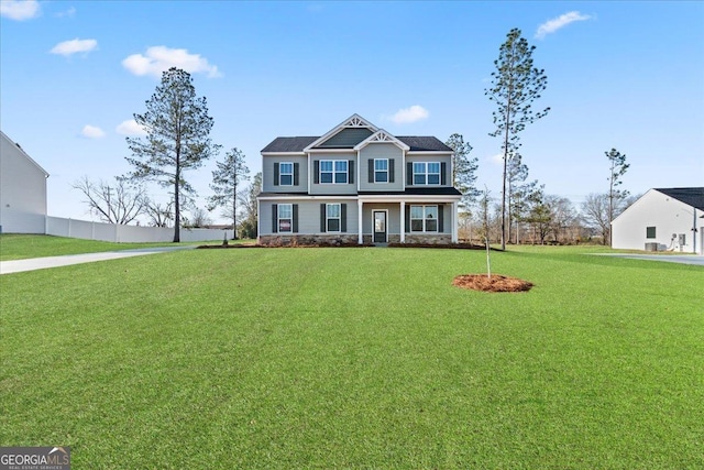 view of front of home with a front yard