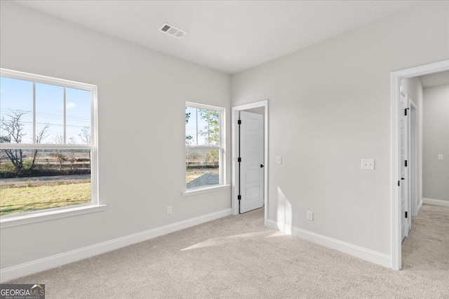 view of carpeted spare room