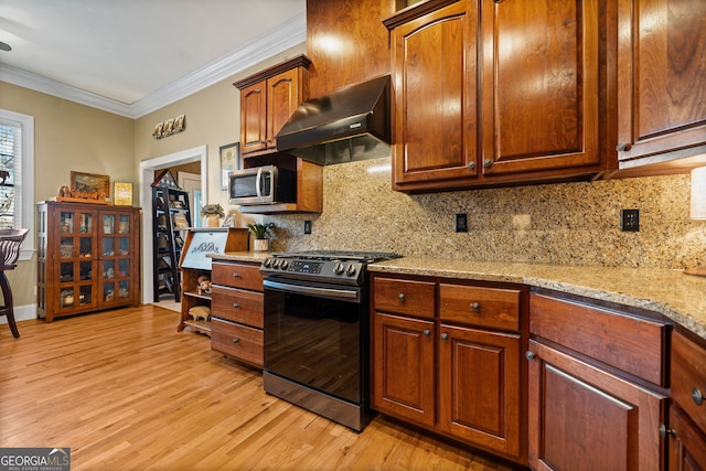 kitchen featuring stainless steel appliances, crown molding, light stone countertops, decorative backsplash, and exhaust hood