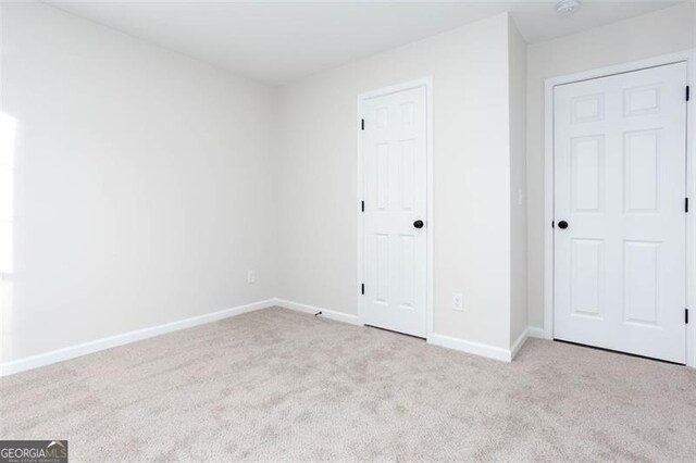 interior space with light colored carpet