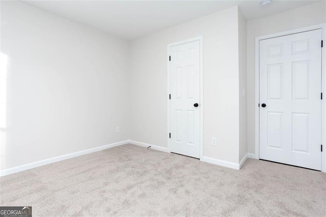 4100 Chanticleer Dr, Kennesaw, GA 30152 - unfurnished bedroom with carpet floors and baseboards