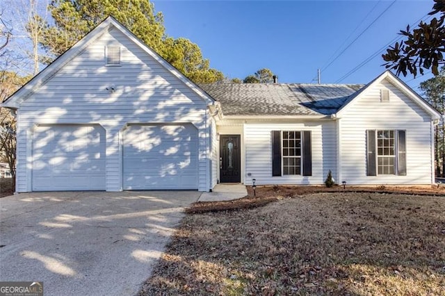 single story home featuring a garage