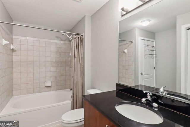 full bathroom featuring toilet, vanity, and shower / bath combo