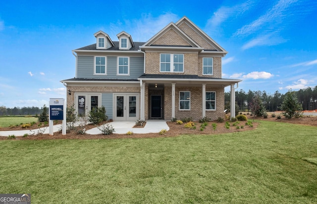 craftsman inspired home with french doors and a front yard