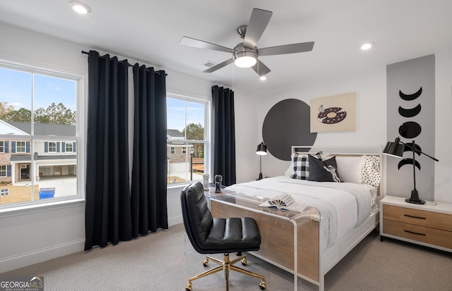 carpeted bedroom with ceiling fan