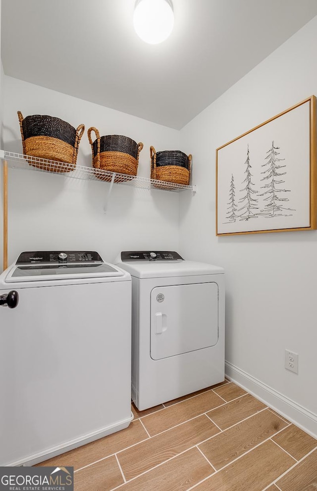 laundry area featuring independent washer and dryer