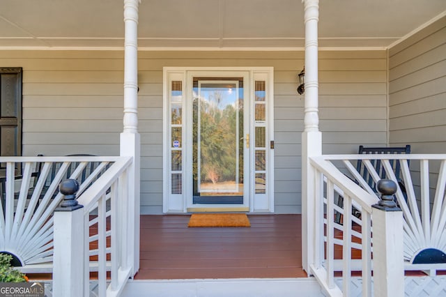 doorway to property featuring a porch