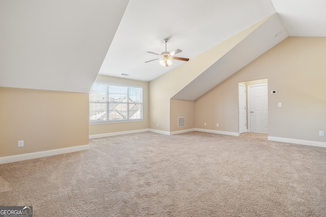 bonus room featuring carpet, lofted ceiling, and ceiling fan