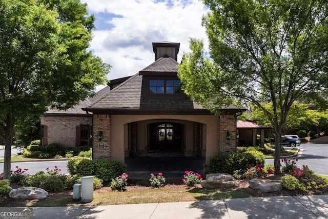 doorway to property featuring a porch