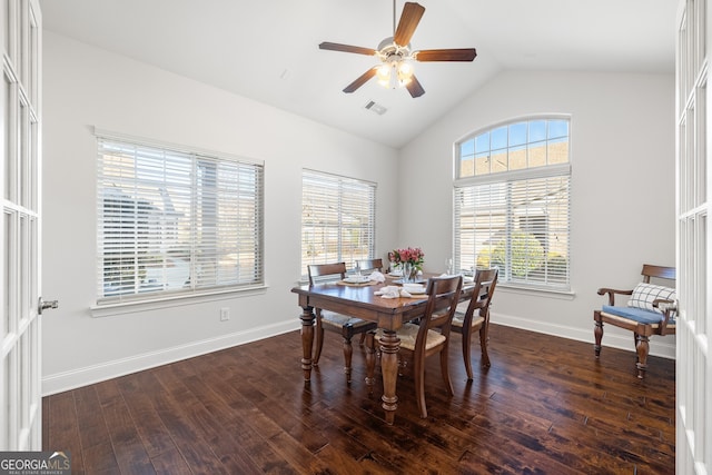 dining area with lofted ceiling, dark wood-type flooring, and ceiling fan