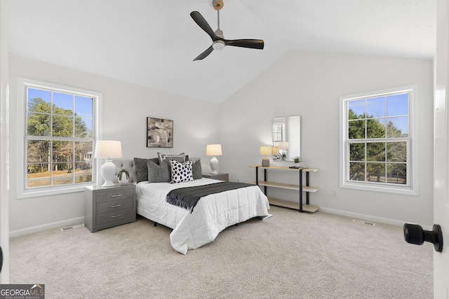 carpeted bedroom featuring ceiling fan and lofted ceiling