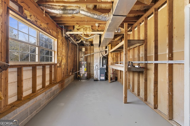 basement with heating unit and water heater