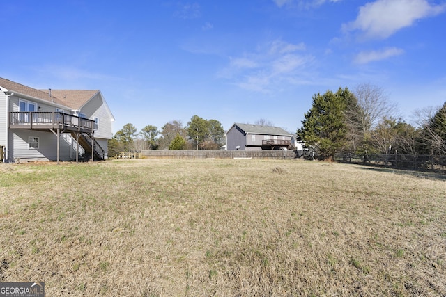 view of yard with a deck