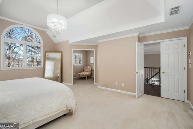 carpeted bedroom with an inviting chandelier and ornamental molding