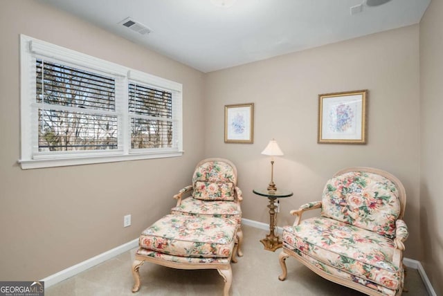 living area with carpet flooring