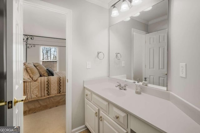 bathroom with vanity and crown molding