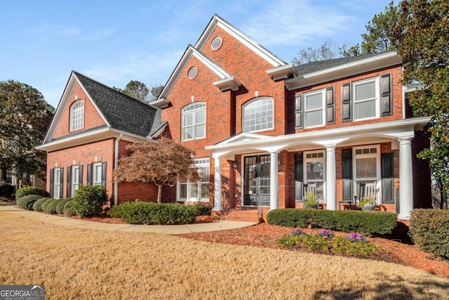 view of front of property with a front lawn