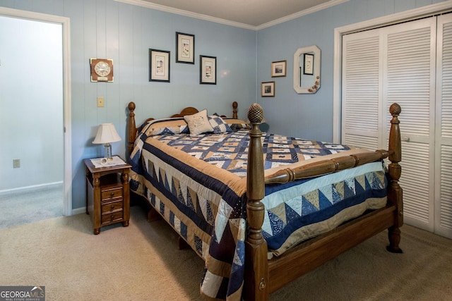 carpeted bedroom featuring a closet and crown molding