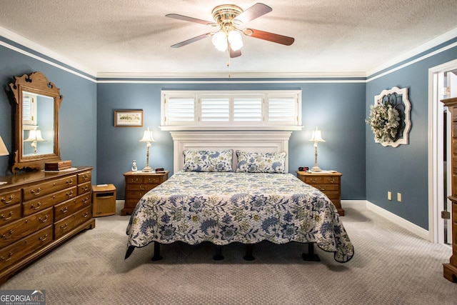 bedroom with ornamental molding, a textured ceiling, ceiling fan, and light carpet