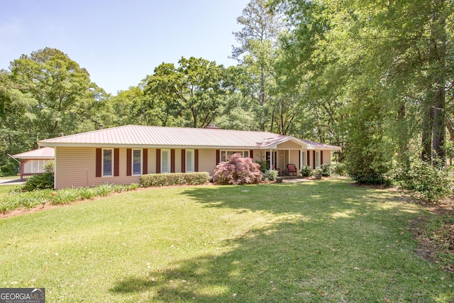 ranch-style home with a porch and a front lawn