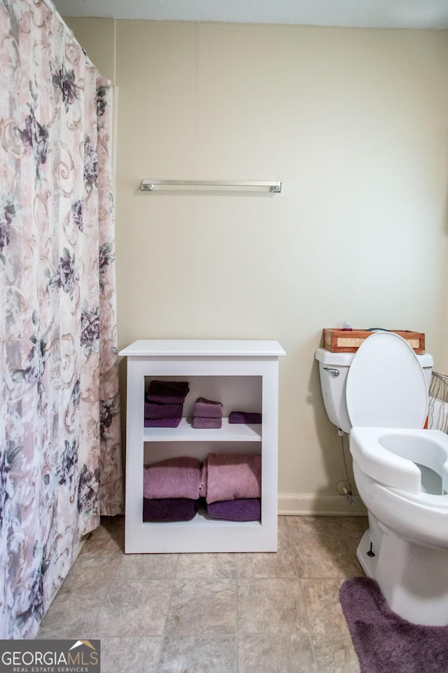 bathroom featuring toilet