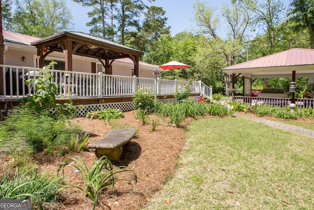 view of yard with a deck and a gazebo