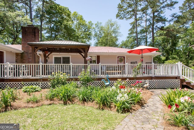 view of front of property featuring a deck