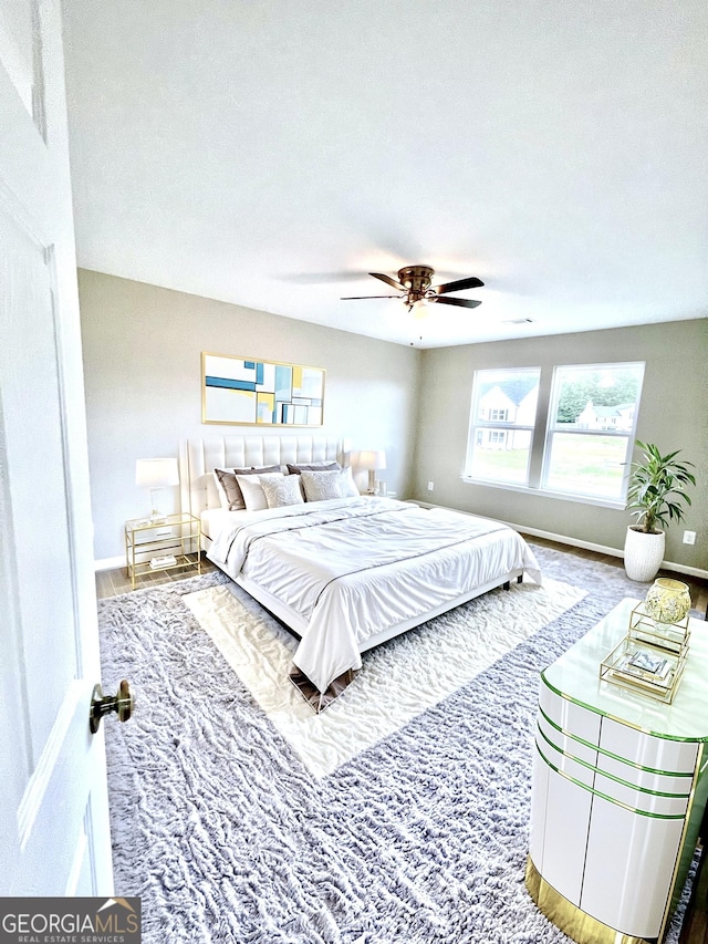 bedroom featuring ceiling fan