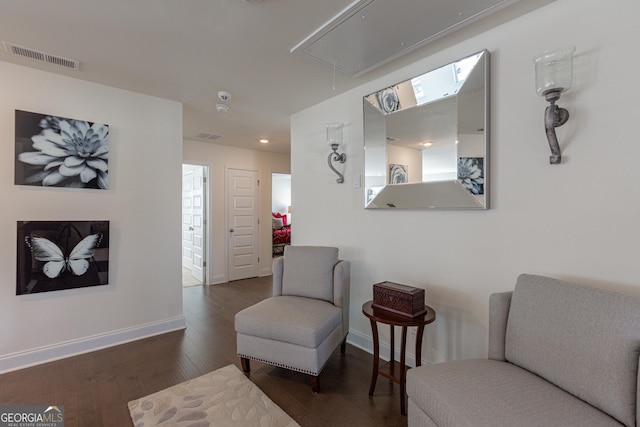 living area featuring dark hardwood / wood-style flooring