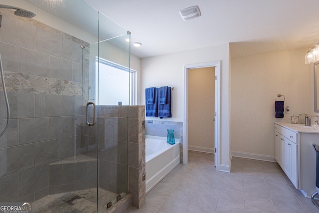 bathroom with separate shower and tub, tile patterned floors, and vanity