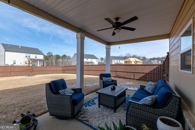 view of patio featuring an outdoor hangout area and ceiling fan