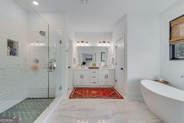 bathroom featuring shower with separate bathtub and vanity