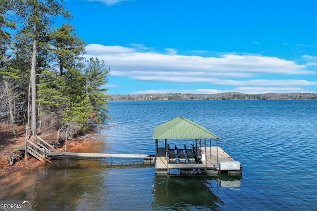 dock area with a water view