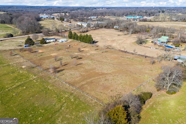 birds eye view of property featuring a rural view