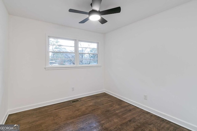 empty room featuring wood-type flooring and ceiling fan