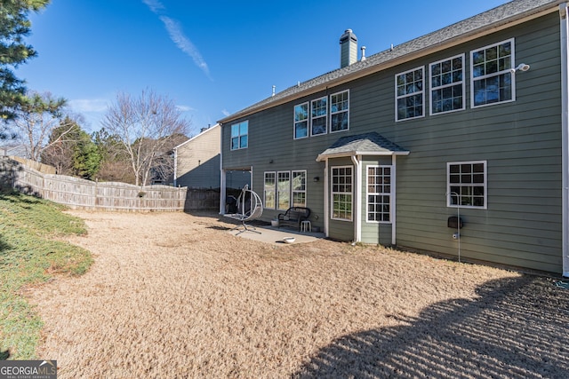 rear view of property with a patio area