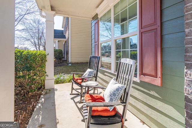 view of patio featuring a porch