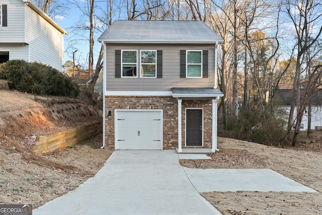 view of front of home with a garage