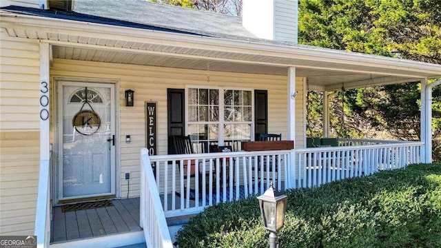 property entrance with a porch